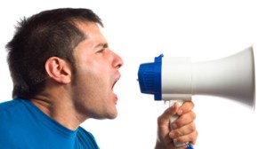 Man Shouting Through Megaphone